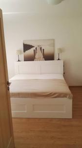Postel nebo postele na pokoji v ubytování Apartmány Nová Pec
