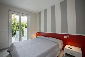 A bed or beds in a room at Casa Orti