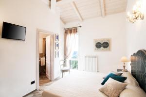 TV a/nebo společenská místnost v ubytování B & B I Ricordi