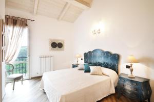 Postel nebo postele na pokoji v ubytování B & B I Ricordi
