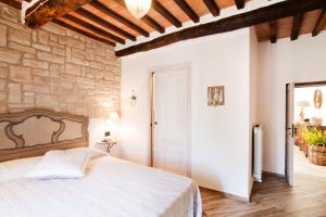 Postel nebo postele na pokoji v ubytování B & B I Ricordi