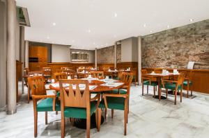 Reštaurácia alebo iné gastronomické zariadenie v ubytovaní Hotel Gótico