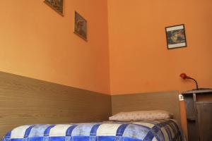 Rúm í herbergi á Albergo della Posta