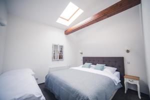 Katil atau katil-katil dalam bilik di Apartmany U Papoušků