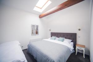 Katil atau katil-katil dalam bilik di Apartmany U Papoušků