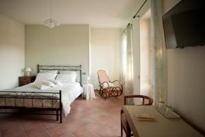 Ліжко або ліжка в номері Il Germano Reale