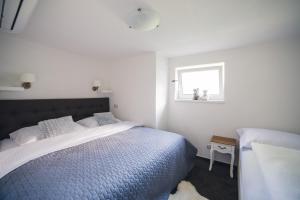 Katil atau katil-katil dalam bilik di Apartmany U Papoušků
