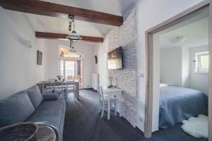 Katil atau katil-katil dalam bilik di Apartmany U Papoušků