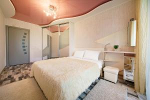 Katil atau katil-katil dalam bilik di PaulMarie Apartments on Voinov Internatsionalistov