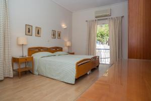 Postel nebo postele na pokoji v ubytování Hotel Saron