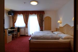 Postel nebo postele na pokoji v ubytování Hotel Falzares