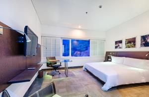 Μια τηλεόραση ή/και κέντρο ψυχαγωγίας στο Hotel Spiwak Chipichape Cali