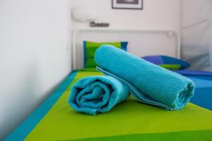 Posteľ alebo postele v izbe v ubytovaní Center eazZynight 2