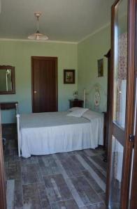 Кровать или кровати в номере Agriturismo Donna Beatrice