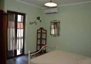 Кровать или кровати в номере Agriturismo Donna Beatrice