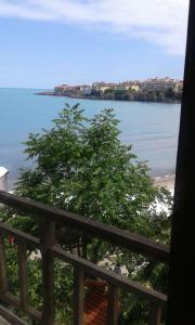 a view of the ocean from a balcony at Agalina Sea House in Sozopol