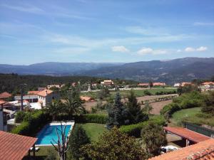 a view of a villa with a swimming pool at Casa Aido Santo in Pinheiro de Lafões +40 photos