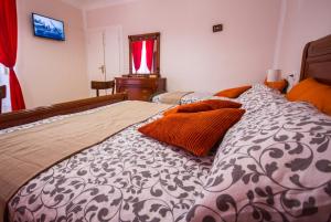 Postel nebo postele na pokoji v ubytování Phiros B&B