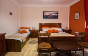 Postel nebo postele na pokoji v ubytování Phiros B&B