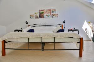 a large bed in a room with at Vacation home Vibor in Dračevica
