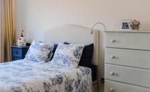 Кровать или кровати в номере Apartamento do Parque