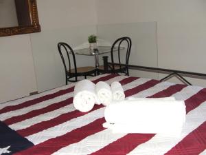 A bed or beds in a room at B&B La Cubanina