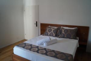 Posteľ alebo postele v izbe v ubytovaní Hotel Old Town