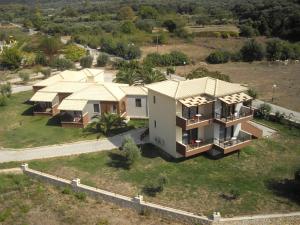 an aerial view of a house in a field at Riviera Perdika Hotel in Perdika
