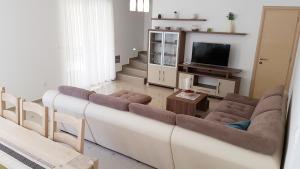 TV a/nebo společenská místnost v ubytování Villas Simag