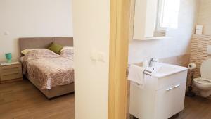 Postel nebo postele na pokoji v ubytování Villas Simag