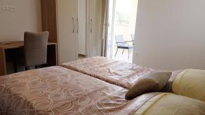 Postel nebo postele na pokoji v ubytování Villas Simag