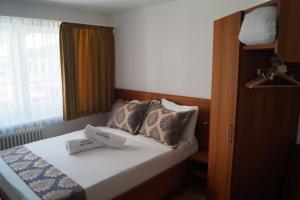 Posteľ alebo postele v izbe v ubytovaní Hotel Old Town