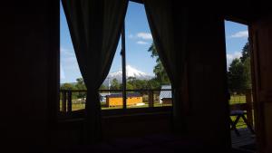 Un balcón o terraza en Rustico Pucon