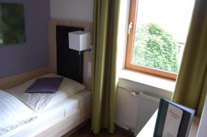 Postel nebo postele na pokoji v ubytování Gasthof Linden & Wildkräuterhotel