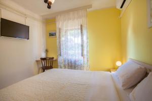 Postel nebo postele na pokoji v ubytování Rooms Ester