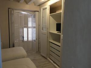 Posteľ alebo postele v izbe v ubytovaní Casa Bugambilla Cadiz