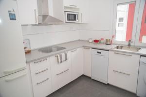 Kuchyňa alebo kuchynka v ubytovaní Apartamento Talako