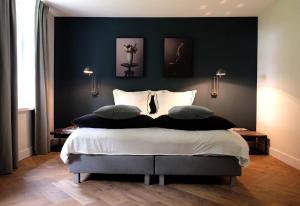 Postel nebo postele na pokoji v ubytování Bed & Breakfast Karakter