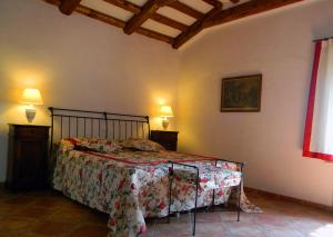Postel nebo postele na pokoji v ubytování Residenza Cà d´Masseu