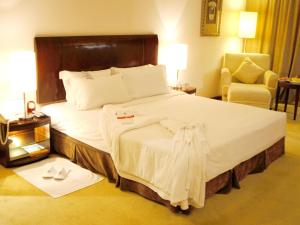 Cama o camas de una habitación en Grand Metropark Wanshi Hotel Taiyuan