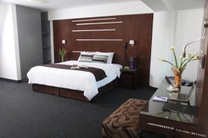 Postel nebo postele na pokoji v ubytování Hotel Rivera Inn + 25 fotografií