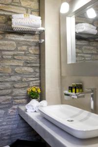 Ett badrum på Hotel Minelska Resort