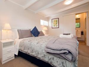 Säng eller sängar i ett rum på Flaxmill Accommodation