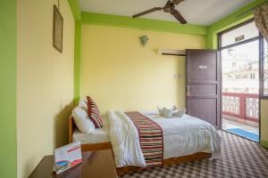 Ένα ή περισσότερα κρεβάτια σε δωμάτιο στο Hotel Yala Peak