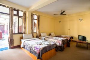 Ένα ή περισσότερα κρεβάτια σε δωμάτιο στο Hotel Yala Peak