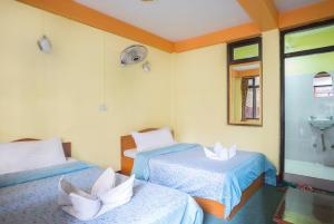 Ένα ή περισσότερα κρεβάτια σε δωμάτιο στο Hotel Yala Peak