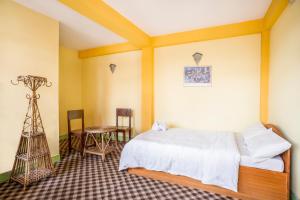 Ένα ή περισσότερα κρεβάτια σε δωμάτιο στο Hotel Yala Peak