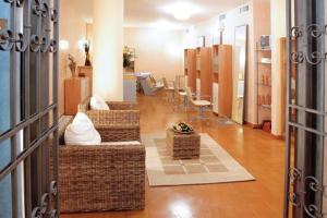 Posezení v ubytování Sporting Baia Hotel