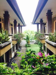 Zahrada ubytování Tanjung Sari Inn
