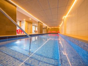 a swimming pool in a building at Golden Donaire Beach 4 Sup in La Pineda